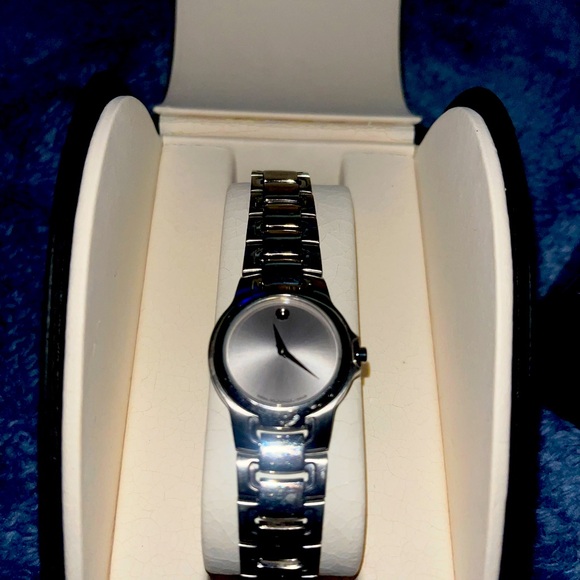 Woman’s vintage silver band and face Movado watch